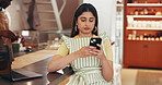 Internet, business and woman in coffee shop, cellphone and typing with social media, contact and email. Person, customer and smartphone in cafe, network and digital app with communication and message
