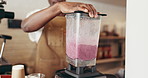 Hands, person and blender for smoothie at cafe for healthy drink, customer order and supplement. Business owner, machine and ingredients for protein shake, wellness benefits and hospitality services