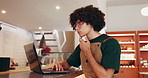 Laptop, man and barista thinking in cafe for menu ideas, typing or order stock. Coffee shop, owner and computer in small business for planning inventory with online sales, review and problem solving