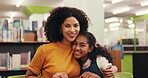 Face, teacher or student hug in library, encourage reading and caring support for education development. Happy, woman or girl embrace at school, positive learning environment and language skill boost