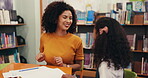 Woman, child or high five at library with books, happy or teaching for extra class session. Support, mother or daughter in study room with homework, writing or learning for childhood development

