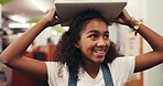 Child, student and book on head in library for learning, story time and literature education. Smile, kid and walking with novel for studying, language development and scholarship for knowledge growth