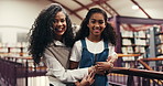 Face, senior mother and daughter with hug in library for bonding together, connection or development. Smile, parent and child with embrace in bookshop for knowledge, learning support or storytelling.