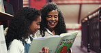Story, library and grandmother reading with child for bonding, connection or development. Happy, education and senior woman with girl kid for book together on stairs for knowledge and learning.