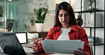 Laptop, research and documents with business woman in office for planning, project graph and branding review. Social media marketing, online campaign and post update with person in creative agency