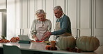 Old couple, talk and cooking in kitchen with tablet for online recipe, connection or thanksgiving dinner. Married, elderly people and discussion in home with tech for food app, meal prep and bonding.
