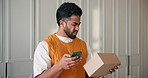 Man, confused and box with phone for delivery mistake, wrong shipping or package in home. Frustrated, male person or poor service with parcel or mobile smartphone for online shopping error or bad app