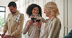 Family, cooking and toast with wine in kitchen, bonding and happy together in apartment. Man, women and cheers with alcohol in home, meal preparation and thanksgiving celebration with senior parent