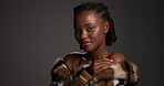 Luxury skincare, face or black woman in studio for glamour, makeup or laugh. Beauty aesthetic, portrait or funny model with cosmetic, fur coat or touch shoulder for body care on dark background space