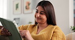 Laughing, woman and online with tablet, home and browsing website for entertainment, ebook and relax. Scroll, app and person with tech for funny story, humor and chill in house, reading or literature