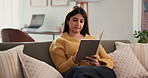 Happy, reading and woman with book on sofa to relax, rest and comfortable with hobby in home. Weekend, living room and person with novel, story and literature for learning, entertainment and fiction