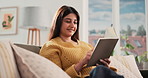 Happy, reading books and woman on sofa to relax, rest and comfortable with hobby in home. Weekend, living room and person with novel, story and literature for learning, entertainment and fiction