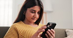 Home, smartphone and woman with smile, typing and relax with social media, texting and online chatting. Message, communication and person on couch, cellphone and network with connection and email