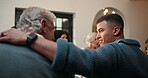 Back, conversation and hug with family at thanksgiving event for holiday celebration together. Bonding, talking or tradition with mature father and man son embracing in apartment for relationship