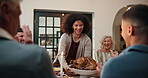 Thanksgiving, turkey and celebration with family in dining room for festive holiday, applause or tradition. Roast chicken, gratitude or nutrition with food and people in home for clapping and support