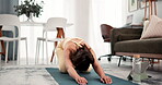 Yoga, woman and tablet with stretching in home for online class, fitness lesson or morning warm up. Yogi, person and balasana pose on mat for virtual workout, internet tutorial and muscle flexibility