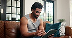 Relax, reading and tablet with man on sofa for streaming service notification and typing. Movie subscription search, online film and media app with person in living room of home for download