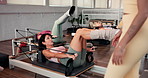 Pilates, reformer and woman in studio, health and fitness with routine, wellness and exercise. People, trainer and instruction with workout, strength training  or machine with challenge or resistance