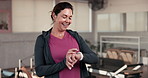 Fitness, pilates and time with happy woman in gym for tracking performance or progress on app. Exercise, reformer and watch with mature person in health club for development, training or wellness