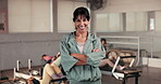 Face, fitness instructor and happy woman with arms crossed in gym for training class, pride and ready to coach. Confident, client advice and people in health club to exercise, workout and sports.