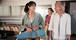 Arrive, talking and women friends walking into pilates class together for start of course. Conversation, fitness and wellness with mature people in gym studio for bonding, development or exercise
