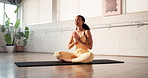 Happy woman, yoga and breathing with meditation in studio on mat for spiritual wellness or zen. Calm, female person or balance with namaste for inner peace, awareness or holistic healing on floor