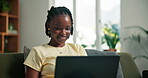 Laptop, reading and student or black woman on sofa for elearning portal, research and study schedule. Assignment submission, university course and virtual class with person in living room of home
