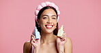 Face, woman or serum bottles in studio for skincare review, hydration treatment and essential oil. Mockup space, beauty influencer and happy on pink background for product comparison or range launch