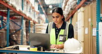 Manufacturing, typing and woman with laptop, warehouse or connection for schedule review. Supply chain, technology and employee in factory with checklist, feedback or email for export or ecommerce