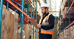 Clipboard, man and logistics employee in warehouse for inventory management, shipping or storage. Research, cardboard boxes and male supply chain worker with order for distribution in factory.