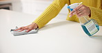 Hands, spray and cloth on kitchen counter in home with routine for hygiene, dust or germs. Person, bottle and liquid for bacteria, spring cleaning or sanitation with product for dirt removal at house