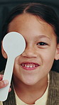 Optometry, eye test and face of child in clinic for consulting, prescription lens and vision exam. Healthcare, optician tools and portrait of happy girl with diagnosis for frames, glasses and sight