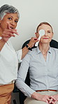 Talking, mature women and eye exam in clinic, point and explaining vision assessment and healthcare. Eyesight, test and patient with oculist for medical checkup, people and consultation in hospital