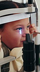 Vision, eye test and child with tonometer in clinic to measure IOP, examination and assessment. Light beam, girl patient and medical equipment for eyesight checkup, glaucoma screening and healthcare