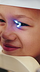 Girl, machine and eye retina scanner with vision problem, consultation and healthcare. Equipment, client and child with sight, optometrist appointment and examine with assessment, smile and patient