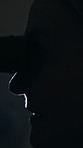 Closeup, eye scan and profile with optometry, consultation and vision machine on dark background. Person, retina and medical test for diagnosis, optical wellness or assessment for prescription
