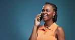 Phone call, laugh and black woman talk in studio, communication and chat on blue background. Mobile, funny conversation and person speaking to contact for news, gossip and story with mockup space