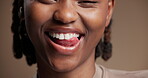 Dental, closeup or black woman in studio with lick, mouth or tooth wellness in orthodontics. Face, happiness and female person on brown background with hygiene, whitening or dentistry in oral health.