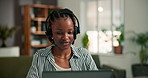 Laptop, call center consultant and black woman with remote work, technical support or help desk. Freelancer, headset and agent talk with computer for IT assistance, customer service and bokeh in home