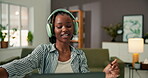 Laptop, lounge and woman dance with headphones, study break or streaming music to relax. Elearning, radio listening or black person with audio tech in home, pc or playlist for distance education