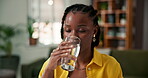 Drinking, morning and woman in house with water, hydration and digestion support in daily routine. Health, h20 and female person in living room with cold beverage, mineral liquid and detox in thirst.
