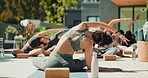 Fitness, outdoor and instructor with class for pilates workout with wellness, health and training. Calm, balcony and back of trainer with group of people for yoga exercise together with stretching.