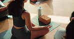 Meditation, yoga and people in studio with mat, block and wellness for relaxation. Person, balance and peace in class session with posture, mindfullness and breathing for mental health benefits.