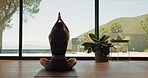 Meditation, woman and mindfulness in home, yoga and wellness on floor, back and calm in living room. Healthy, routine and person on mat for self awareness, zen and sukasana with inner peace benefits