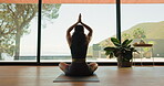 Meditation, woman and posture in home, yoga and mindfulness on floor, routine or calm in living room. Wellness, zen and person on mat for self awareness, back and sukasana with inner peace benefits