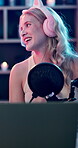 Laptop, influencer headphones or happy woman with microphone for broadcast, gossip talk show or podcast. Audio tech, gen z presenter or pc for live stream, joke comment or audience question for laugh