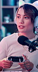 Game controller, influencer headphones and woman with microphone, content creator and esports player. Audio tech, gaming channel and streamer with console for video recording, commentary and gen z.