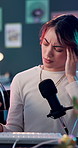 Headache, podcast and vr headset with woman in studio for live streaming or product review. Brain fog, eye strain and side effects with influencer person in virtual reality for immersive experience
