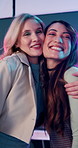 Face, hug and wave with woman friends in recording studio together for bonding or connection. Energy, excited and smile of happy people embracing for motivation or support as content creators
