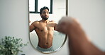 Getting ready, man or flexing by mirror in bathroom, check body development or fitness results. Reflection, bicep growth inspection or person with pride in home, grooming routine or workout progress.